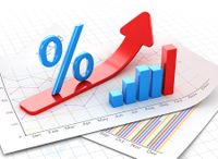 stock-foto-percent-symbol-and-business-chart-on-financial-paper